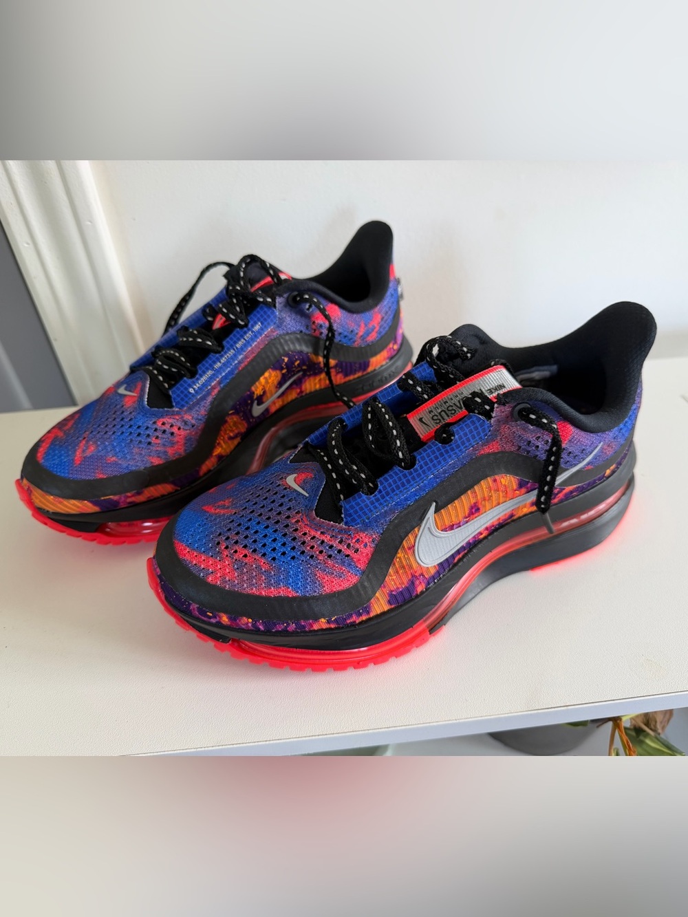 Woman’s Nike Pegasus Bright crimson